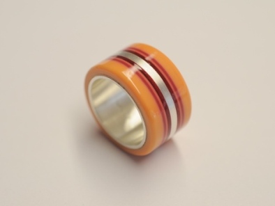 Silberring mit orange-rot Acetat