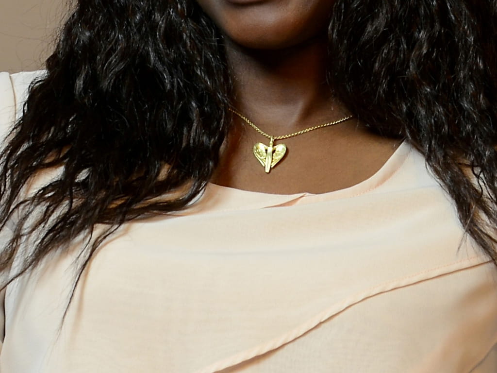 Schutzengel Anhänger - 750 Gelbgold mit Brillanten sehr guter Qualität